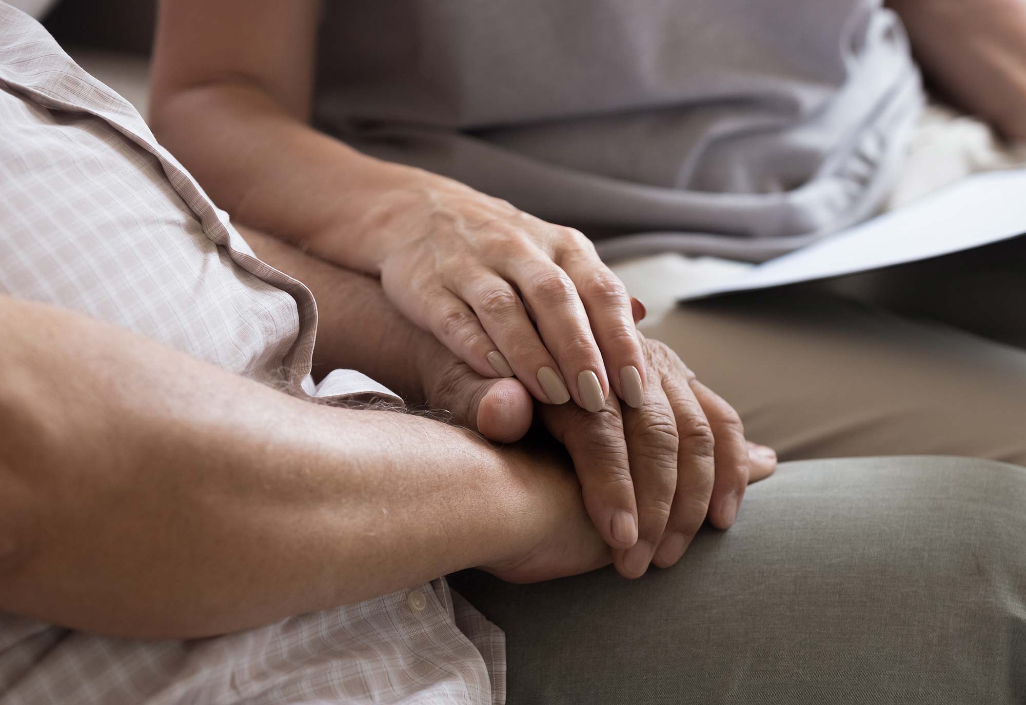 older couple holiding hands