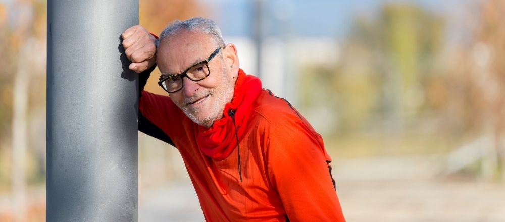Middle aged man resting after a run